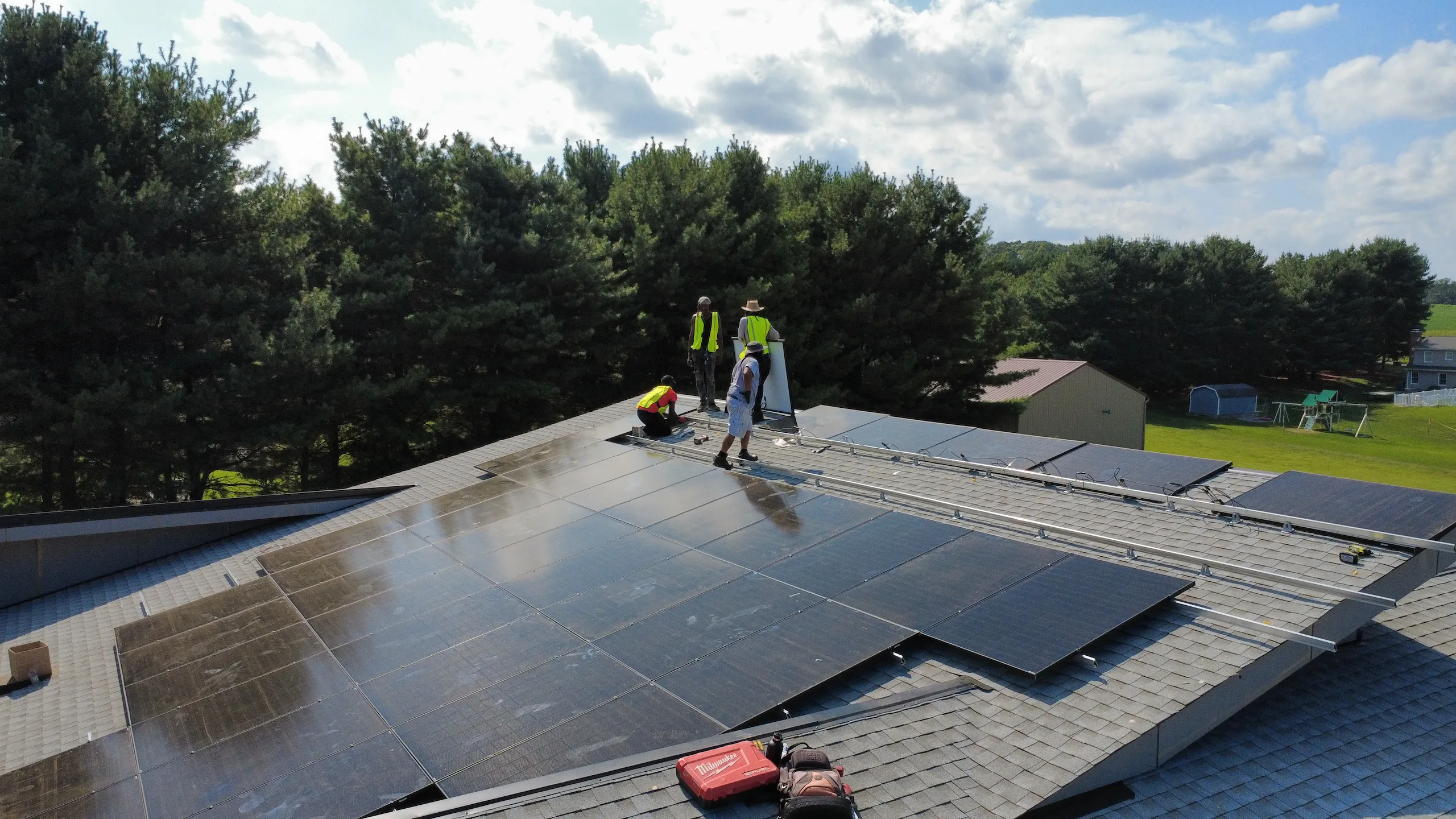 Aduu Solar professional installation - aerial view of residential rooftop solar panels